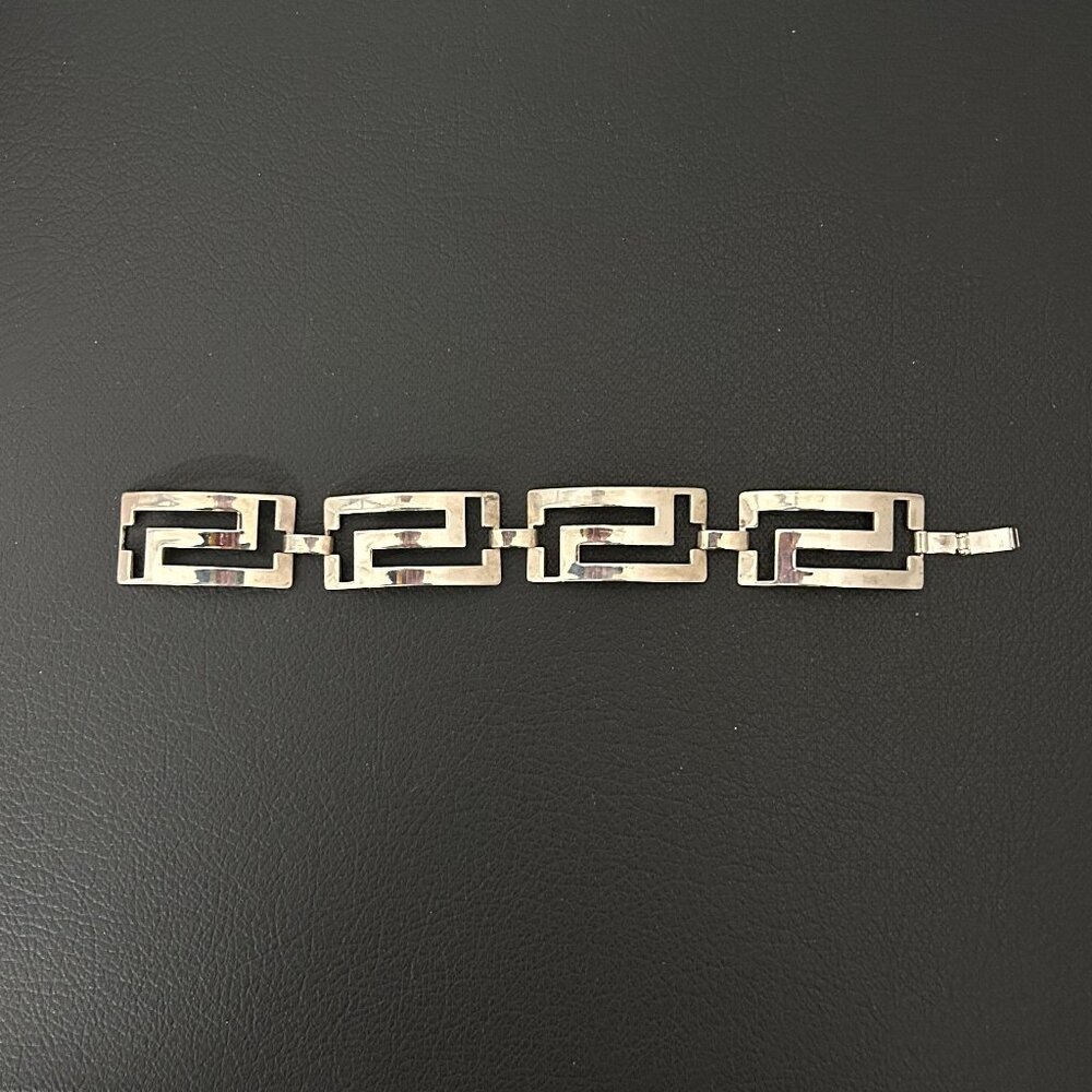Silvertone Greek key design link bracelet